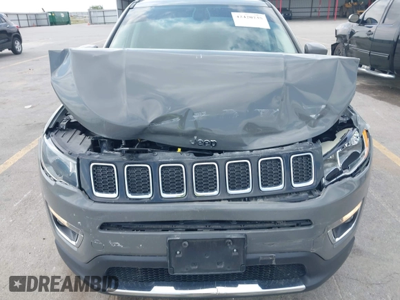 2020 Jeep Compass Limited with VIN 3C4NJCCB8LT128866, listed as a IAAI auction lot 42420735 with 149,565 mi miles and . Bid and sale history available at DreamBid. Image 6.