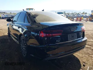 2016 Audi A6 Premium Plus z VIN WAUGFAFC8GN103391, wystawiony jako IAAI lot #41341007 z przebiegiem 130 581 mil mil oraz . Historia ofert i sprzedaży dostępna na DreamBid. Obrazek 3.