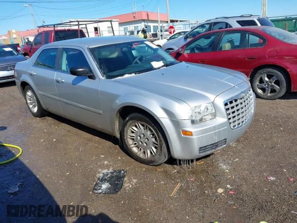 2005 Chrysler 300 with VIN 2C3JA43RX5H569173, listed as a IAAI auction lot 41618421 with 126,019 mi miles. Bid and sale history available at carsss.com. Image 1.