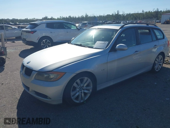 2007 BMW 3 Series 328i with VIN WBAVS13547FX16529, listed as a IAAI auction lot 41769488 with 88,993 mi miles. Bid and sale history available at carsss.com. Image 2.