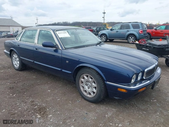 1998 Jaguar XJ with VIN SAJHX124XWC844575, listed as a IAAI auction lot 41951600 with 97,458 mi miles. Bid and sale history available at carsss.com. Image 1.