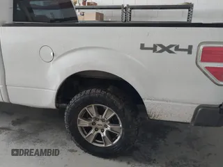 2014 Ford F-150 XL with VIN 1FTFW1EF5EKE45762, listed as a IAAI auction lot 41762773 with 203,423 mi miles. Bid and sale history available at carsss.com. Image 6.