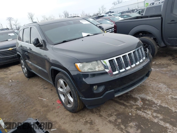 2013 Jeep Grand Cherokee Overland with VIN 1C4RJFCG1DC593890, listed as a IAAI auction lot 41264434 with 204,324 mi miles. Bid and sale history available at carsss.com. Image 1.