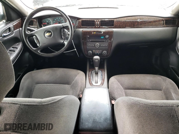 2014 Chevrolet Impala LT with VIN 2G1WB5E32E1100531, listed as a Copart auction lot 55635635 with 292,383 mi miles and Salvage title. Bid and sale history available at DreamBid. Image 8.
