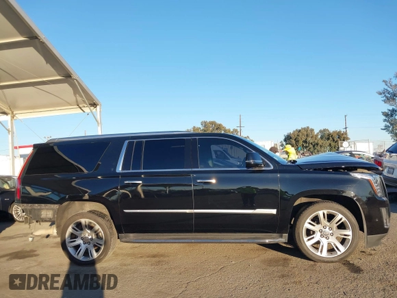 2020 Cadillac Escalade ESV Luxury z VIN 1GYS4HKJ3LR181834, wystawiony jako IAAI lot #40813416 z przebiegiem 65 857 mil mil oraz . Historia ofert i sprzedaży dostępna na DreamBid. Obrazek 14.
