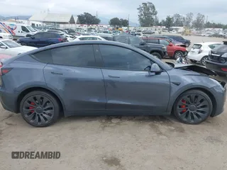 2023 Tesla Model Y Performance z VIN 7SAYGDEF1PF925274, wystawiony jako IAAI lot #42078813 z przebiegiem 20 422 mil mil oraz . Historia ofert i sprzedaży dostępna na DreamBid. Obrazek 12.