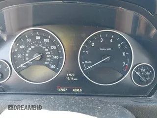 2014 BMW 3 Series 328i with VIN WBA3A5G57ENP28138, listed as a IAAI auction lot 41760371 with 147,897 mi miles and . Bid and sale history available at DreamBid. Image 7.