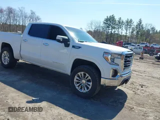 2022 GMC Sierra 1500 SLT with VIN 3GTU9DET9NG210715, listed as a IAAI auction lot 41870747 with 61,371 mi miles and . Bid and sale history available at DreamBid. Image 1.
