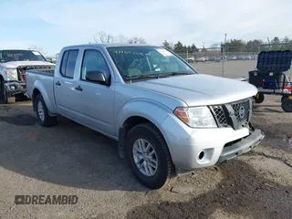 2014 Nissan Frontier SL z VIN 1N6AD0FV3EN767134, wystawiony jako IAAI lot #41463305 z przebiegiem 63 553 mil mil oraz . Historia ofert i sprzedaży dostępna na DreamBid. Obrazek 1.