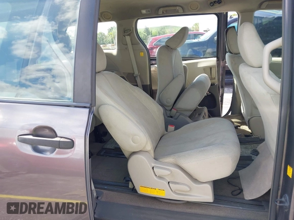 2012 Toyota Sienna with VIN 5TDZK3DC8CS190719, listed as a IAAI auction lot 41983695 with 68,377 mi miles and . Bid and sale history available at DreamBid. Image 8.