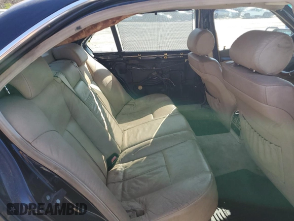 1996 BMW 7 Series 740iL z VIN WBAGJ8328TDL35931, wystawiony jako Copart lot #52402765 z przebiegiem Nie podano mil oraz Czysty tytuł • Clean title. Historia ofert i sprzedaży dostępna na DreamBid. Obrazek 10.