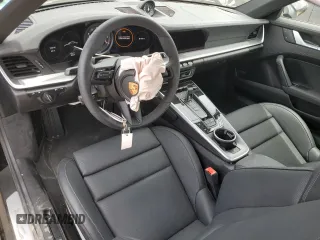 2024 Porsche 911 Carrera S with VIN WP0AB2A92RS218949, listed as a Copart auction lot 57306844 with 1,296 mi miles and Salvage Title. Bid and sale history available at carsss.com. Image 8.