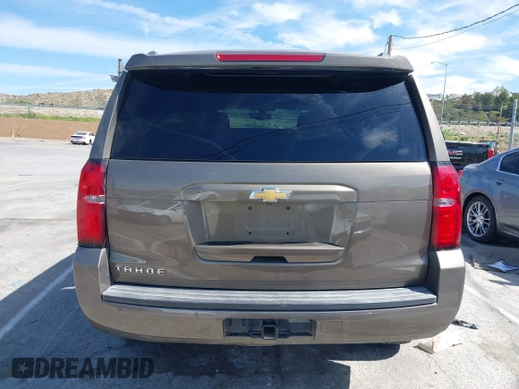 2016 Chevrolet Tahoe LS with VIN 1GNSCAKC7GR419294, listed as a IAAI auction lot 42020006 with 83,945 mi miles and . Bid and sale history available at DreamBid. Image 16.