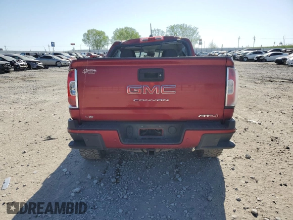 2022 GMC Canyon 4WD AT4 z VIN 1GTG6FEN9N1111989, wystawiony jako Copart lot #52967635 z przebiegiem 39 389 mil mil oraz Szkoda całkowita • Salvage title. Historia ofert i sprzedaży dostępna na DreamBid. Obrazek 6.