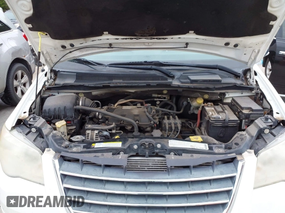 2010 Chrysler Town & Country Touring with VIN 2A4RR5D14AR133746, listed as a IAAI auction lot 42116450 with 221,775 mi miles. Bid and sale history available at carsss.com. Image 10.