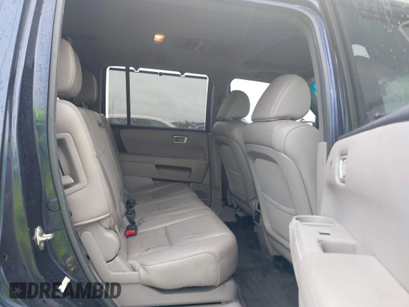 2013 Honda Pilot Touring with VIN 5FNYF4H95DB007125, listed as a IAAI auction lot 42493693 with Not provided miles and . Bid and sale history available at DreamBid. Image 8.