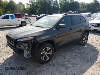 2014 Jeep Cherokee Trailhawk with VIN 1C4PJMBS1EW304718, listed as a Copart auction lot 64105485 with 151,315 mi miles and Salvage title. Bid and sale history available at DreamBid. Image 1.