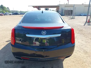 2013 Cadillac XTS Premium z VIN 2G61S5S34D9127996, wystawiony jako IAAI lot #41978539 z przebiegiem 185 157 mil mil oraz . Historia ofert i sprzedaży dostępna na DreamBid. Obrazek 18.