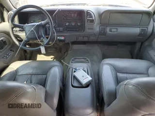 1999 GMC Suburban z VIN 3GKFK16R2XG544767, wystawiony jako Copart lot #67078414 z przebiegiem 154 145 mil mil oraz Szkoda całkowita • Salvage title. Historia ofert i sprzedaży dostępna na DreamBid. Obrazek 8.