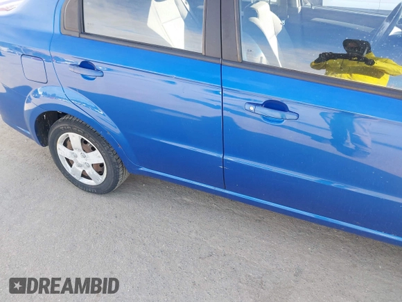 2009 Chevrolet Aveo 1LT with VIN KL1TD56E49B666742, listed as a IAAI auction lot 40585197 with 60,859 mi miles and . Bid and sale history available at DreamBid. Image 6.