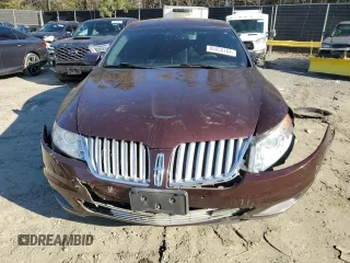 2012 Lincoln MKS with VIN 1LNHL9ER2CG802577, listed as a Copart auction lot 85455164 with 121,169 mi miles and Salvage Title. Bid and sale history available at DreamBid. Image 5.