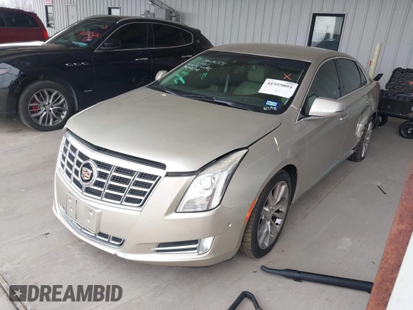 2015 Cadillac XTS Luxury z VIN 2G61M5S39F9246298, wystawiony jako IAAI lot #41555093 z przebiegiem 126 928 mil mil oraz . Historia ofert i sprzedaży dostępna na DreamBid. Obrazek 18.