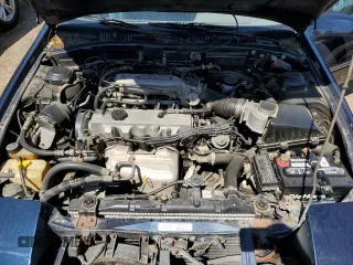 1989 Ford Probe z VIN 1ZVBT21C9K5202343, wystawiony jako Copart lot #55885985 z przebiegiem 150 457 mil mil oraz Czysty tytuł • Clean title. Historia ofert i sprzedaży dostępna na DreamBid. Obrazek 11.