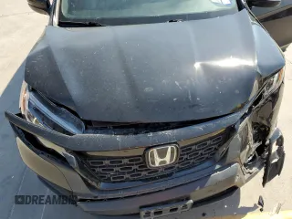 2019 Honda Passport EX-L with VIN 5FNYF7H55KB007265, listed as a Copart auction lot 75749484 with 53,408 mi miles and Salvage Title. Bid and sale history available at carsss.com. Image 12.