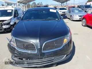 2014 Lincoln MKS with VIN 1LNHL9DK7EG608912, listed as a IAAI auction lot 41722004 with 211,051 mi miles. Bid and sale history available at carsss.com. Image 13.