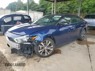 2016 Nissan Maxima Platinum with VIN 1N4AA6AP4GC417412, listed as a Copart auction lot 61597005 with 59,932 mi miles and Salvage title. Bid and sale history available at DreamBid. Image 1.