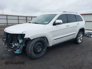 2013 Jeep Grand Cherokee Overland with VIN 1C4RJFCT4DC640553, listed as a IAAI auction lot 41311413 with 146,212 mi miles. Bid and sale history available at carsss.com. Image 2.