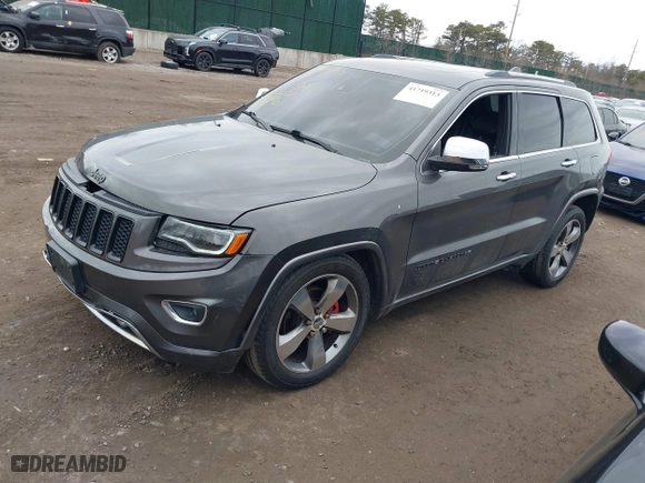 2014 Jeep Grand Cherokee Overland with VIN 1C4RJFCGXEC172008, listed as a IAAI auction lot 41719313 with 164,682 mi miles. Bid and sale history available at carsss.com. Image 17.
