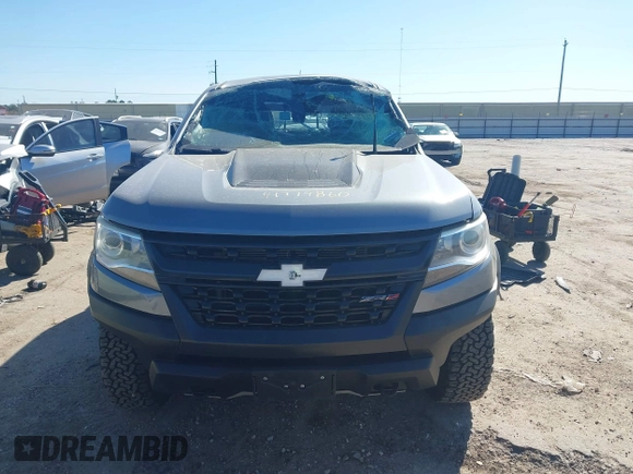 2018 Chevrolet Colorado 4WD ZR2 z VIN 1GCGTEEN0J1115894, wystawiony jako IAAI lot #41774860 z przebiegiem 71 698 mil mil oraz . Historia ofert i sprzedaży dostępna na DreamBid. Obrazek 13.
