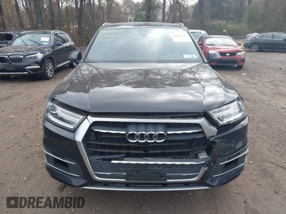 2019 Audi Q7 Premium with VIN WA1AAAF74KD002299, listed as a IAAI auction lot 42066717 with 91,898 mi miles and . Bid and sale history available at DreamBid. Image 12.