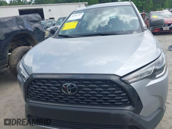2022 Toyota Corolla Cross L with VIN 7MUAAAAG5NV013226, listed as a IAAI auction lot 42491707 with 34,514 mi miles and . Bid and sale history available at DreamBid. Image 12.