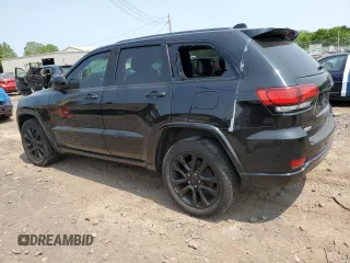 2017 Jeep Grand Cherokee Altitude with VIN 1C4RJFAG5HC892291, listed as a Copart auction lot 58579975 with 71,018 mi miles and Salvage title. Bid and sale history available at DreamBid. Image 2.