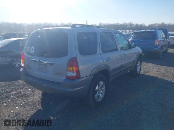 2002 Mazda Tribute LX with VIN 4F2YU081X2KM33854, listed as a IAAI auction lot 41670828 with 225,380 mi miles and . Bid and sale history available at DreamBid. Image 4.
