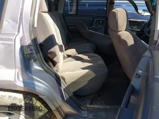 1996 Jeep Grand Cherokee Laredo with VIN 1J4GZ58S1TC168797, listed as a IAAI auction lot 41983746 with 1 mi miles. Bid and sale history available at carsss.com. Image 8.