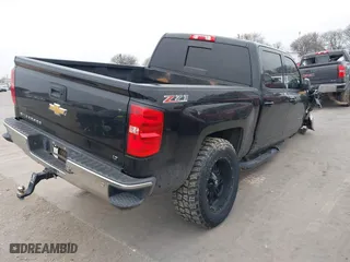 2015 Chevrolet Silverado 1500 LT with VIN 3GCUKREC0FG302637, listed as a IAAI auction lot 40456723 with 145,079 mi miles. Bid and sale history available at carsss.com. Image 4.