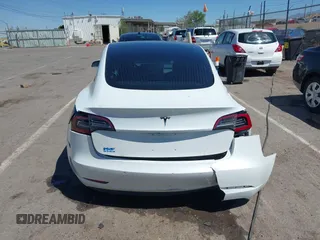 2018 Tesla Model 3 Long Range Battery with VIN 5YJ3E1EA3JF057527, listed as a IAAI auction lot 42072126 with 1 mi miles. Bid and sale history available at carsss.com. Image 15.