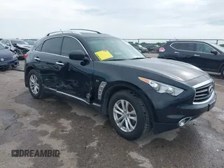 2014 Infiniti QX70 z VIN JN8CS1MU6EM450640, wystawiony jako IAAI lot #42335811 z przebiegiem 143 565 mil mil oraz . Historia ofert i sprzedaży dostępna na DreamBid. Obrazek 1.