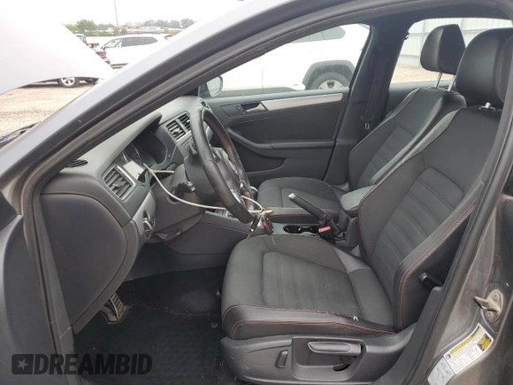 2014 Volkswagen Jetta GLI z VIN 3VW4T7AJ2EM245201, wystawiony jako Copart lot #64901935 z przebiegiem 147 799 mil mil oraz Czysty tytuł • Clean title. Historia ofert i sprzedaży dostępna na DreamBid. Obrazek 7.