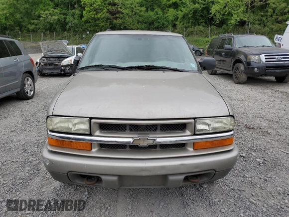 2004 Chevrolet Blazer LS z VIN 1GNDT13X84K162807, wystawiony jako Copart lot #57154205 z przebiegiem 82 732 mil mil oraz Czysty tytuł • Clean title. Historia ofert i sprzedaży dostępna na DreamBid. Obrazek 5.