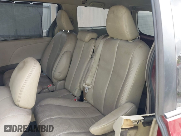 2013 Toyota Sienna XLE AAS z VIN 5TDYK3DC5DS380894, wystawiony jako IAAI lot #42271097 z przebiegiem 145 494 mil mil oraz . Historia ofert i sprzedaży dostępna na DreamBid. Obrazek 8.