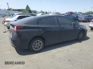 2022 Toyota Prius L Eco с VIN JTDKAMFU3N3161049, выставлен на аукционе Copart как лот 59818135 с пробегом 81 272 миль миль и Списание • Salvage title. История ставок и продаж доступна на DreamBid. Изображение 3.