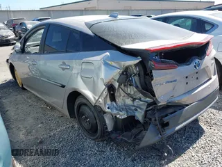2021 Toyota Prius LE with VIN JTDKAMFP5M3167430, listed as a IAAI auction lot 42462853 with 70,492 mi miles and . Bid and sale history available at DreamBid. Image 3.