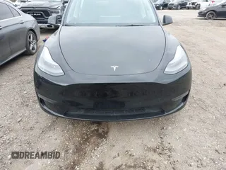 2024 Tesla Model Y с VIN 7SAYGDED5RF093696, выставлен на аукционе IAAI как лот 42061020 с пробегом 21 220 миль миль и . История ставок и продаж доступна на DreamBid. Изображение 13.