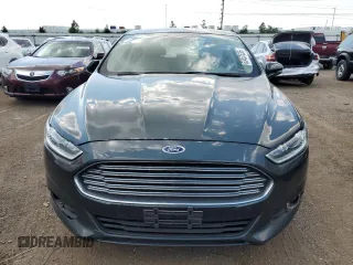 2016 Ford Fusion SE z VIN 1FA6P0HD4G5103633, wystawiony jako Copart lot #63457535 z przebiegiem 169 177 mil mil oraz Czysty tytuł • Clean title. Historia ofert i sprzedaży dostępna na DreamBid. Obrazek 5.