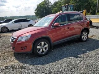 2010 Volkswagen Tiguan Wolfsburg Edition with VIN WVGAV7AX4AW003410, listed as a Copart auction lot 60645845 with 128,563 mi miles and Salvage title. Bid and sale history available at DreamBid. Image 1.