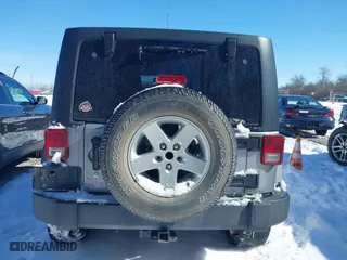 2013 Jeep Wrangler Unlimited Sport with VIN 1C4BJWDGXDL651995, listed as a IAAI auction lot 41578040 with 114,698 mi miles. Bid and sale history available at carsss.com. Image 16.